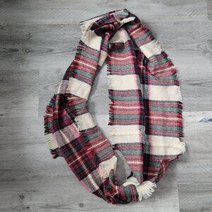 Red, beige, and green plaid infinity scarf with frilled edges